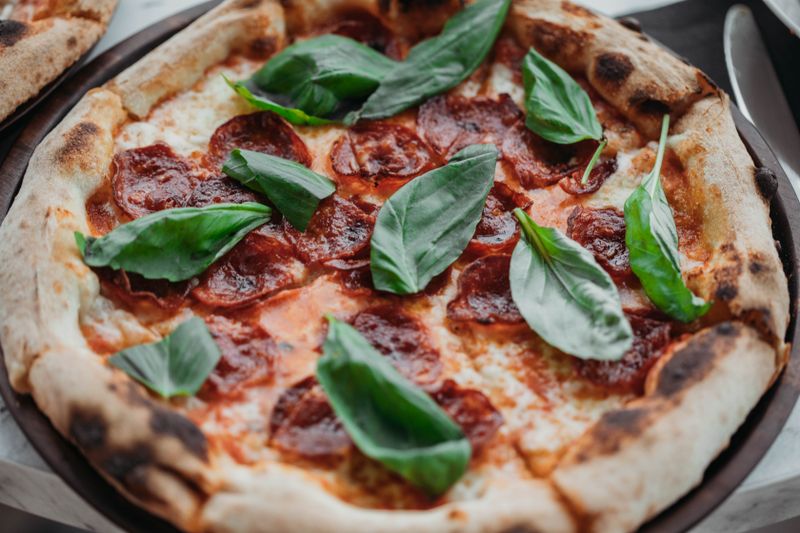 Spicy Pepperoni pizza with fresh toppings at Pizza luce
